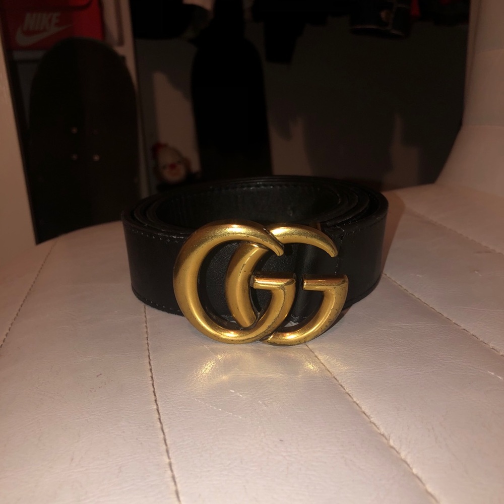 Wide leather belt with double G buckle